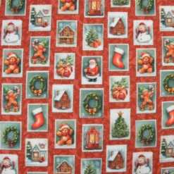 Tissu cretonne coton Noël motif timbres vintage fond rouge
