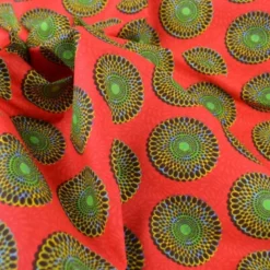 Tissu cretonne coton style wax rouge – Motif rond africain