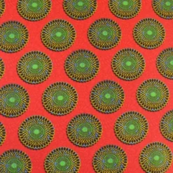 Tissu cretonne coton style wax rouge – Motif rond africain
