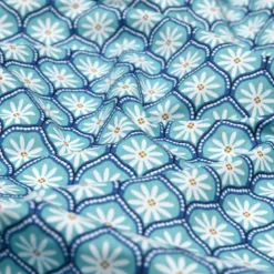Tissu cretonne coton Zea motif graphique fleuri turquoise