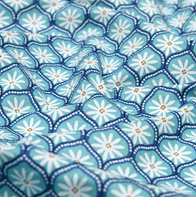 Tissu cretonne coton Zea motif graphique fleuri turquoise