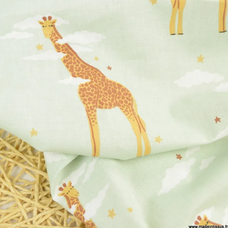 Tissu cretonne coton Zefira motif girafes fond menthe -OEKO TEX