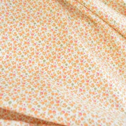 Tissu Cretonne de Coton Caseille motif fleurs roses et oranges