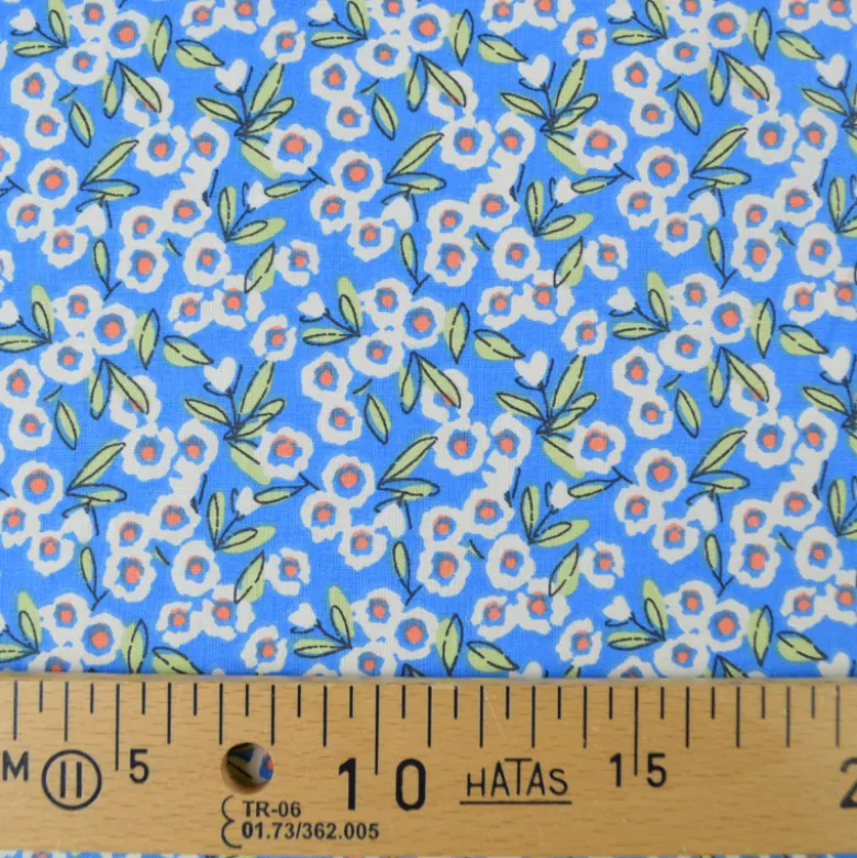 Tissu Cretonne de Coton Fitzia - Motif Petites Fleurs fond bleu