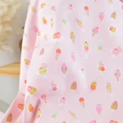 Tissu Cretonne de Coton Gigi motif fleurs rouges et violettes