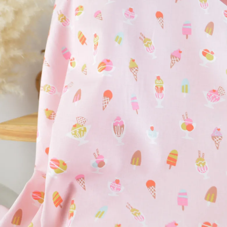 Tissu Cretonne de Coton Gigi motif fleurs rouges et violettes
