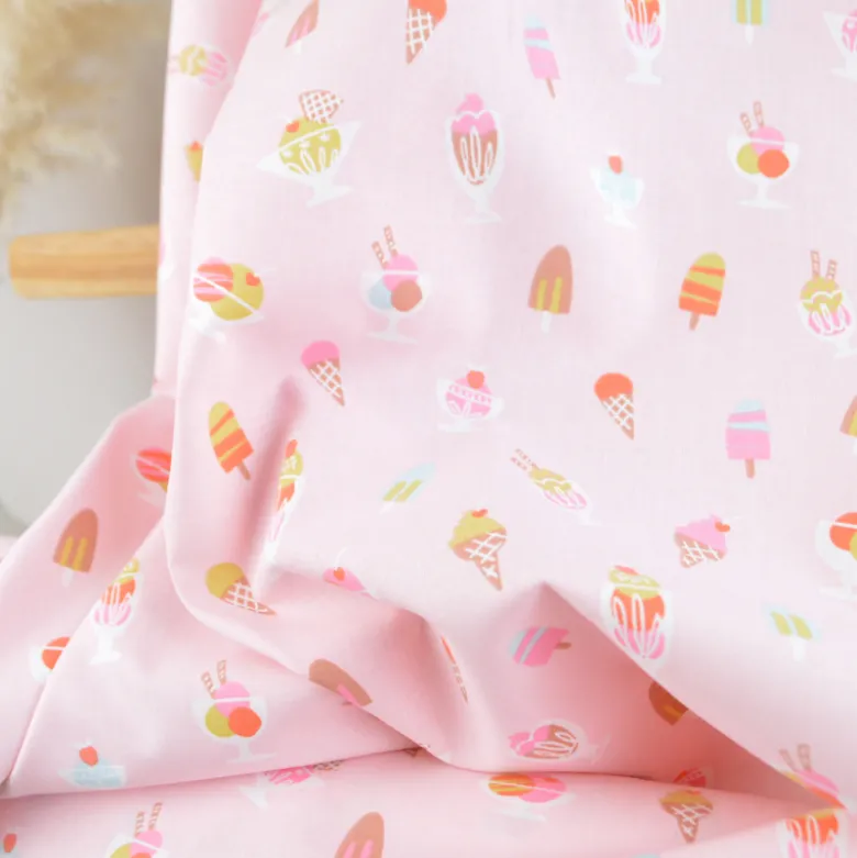 Tissu Cretonne de Coton Gigi motif fleurs rouges et violettes