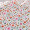 Tissu Cretonne de Coton Maddy motif fleurs roses fond écru