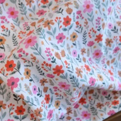 Tissu Cretonne de Coton Maddy motif fleurs roses fond écru