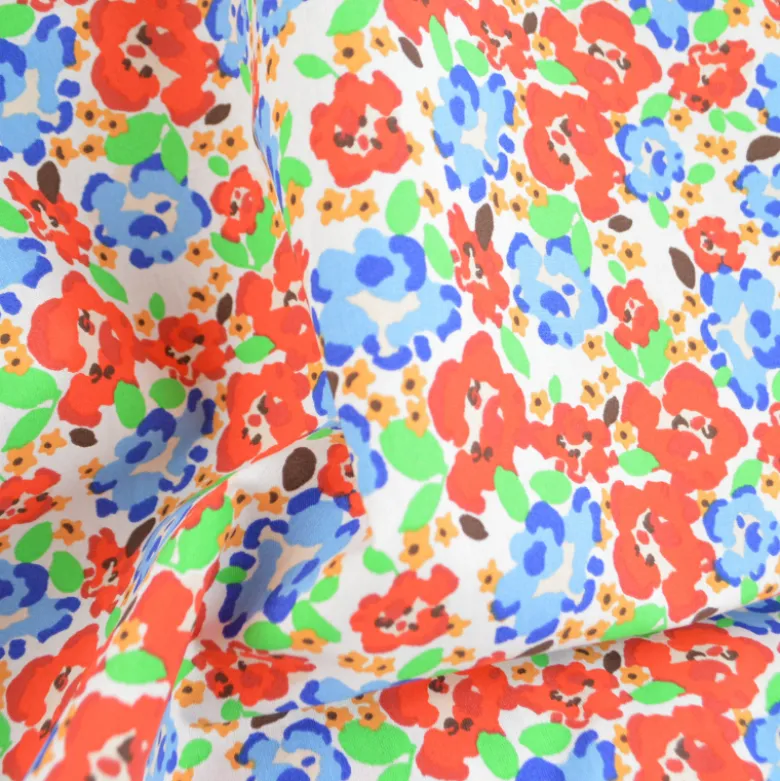 Tissu Cretonne de Coton Odalie motif fleurs rouges et bleues