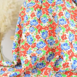 Tissu Cretonne de Coton Odalie motif fleurs rouges et bleues