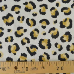 Tissu demi natté coton motif léopard doré fond aspect lin