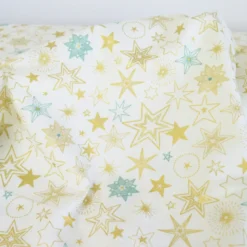 Tissu de Noël Edmé motif étoiles Or fond Blanc cassé - OEKO TEX