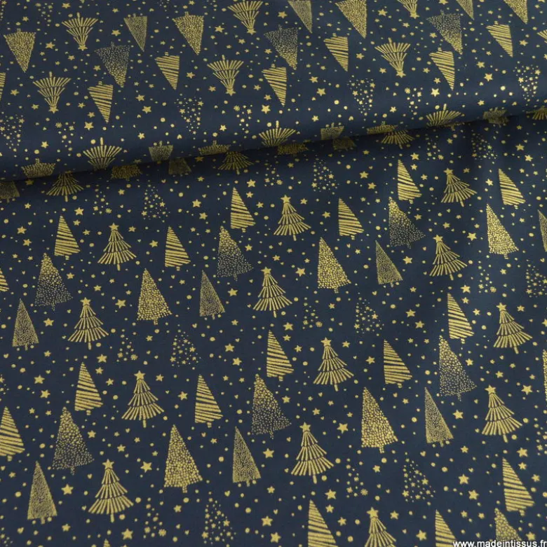 Tissu de Noël motif foret de sapins et étoiles or fond bleu marine - OEKO TEX