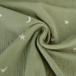 Tissu Double gaze brodée lunes et étoiles fond kaki - OEKO TEX