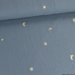 Tissu Double gaze brodée lunes et étoiles fond bleu jean - OEKO TEX