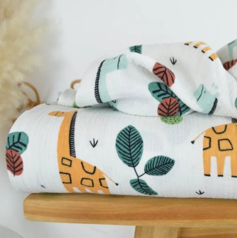 Tissu Double gaze coton motif girafes fond blanc cassé - OEKO TEX