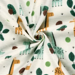 Tissu Double gaze coton motif girafes fond blanc cassé - OEKO TEX