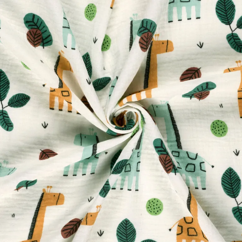 Tissu Double gaze coton motif girafes fond blanc cassé - OEKO TEX
