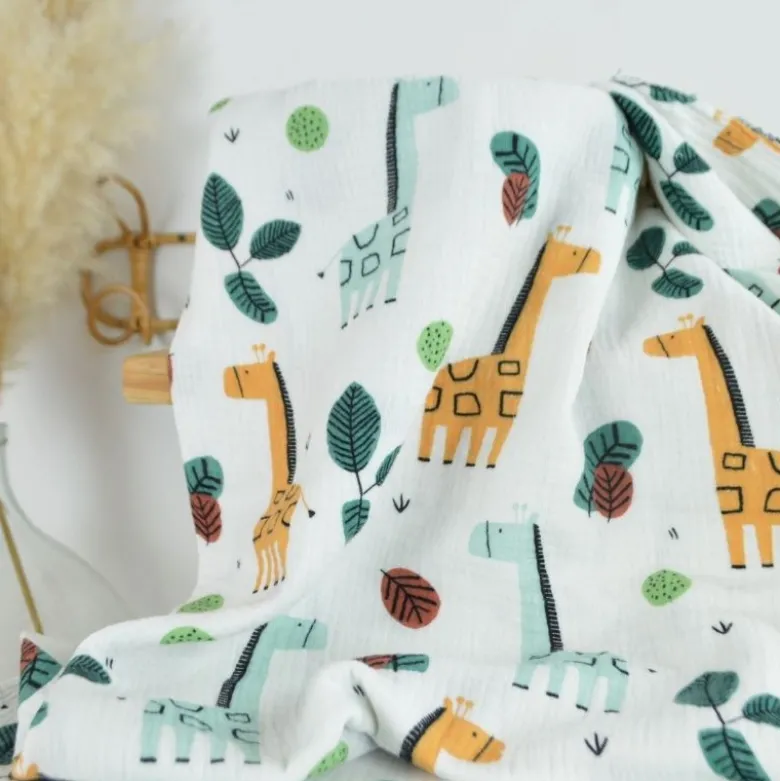 Tissu Double gaze coton motif girafes fond blanc cassé - OEKO TEX