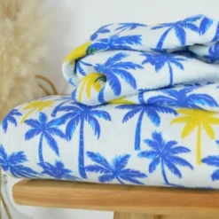 Tissu Double gaze coton motif palmiers bleus et jaunes - OEKO TEX