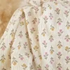 Tissu double gaze de coton Aesa fleurs vertes fond écru