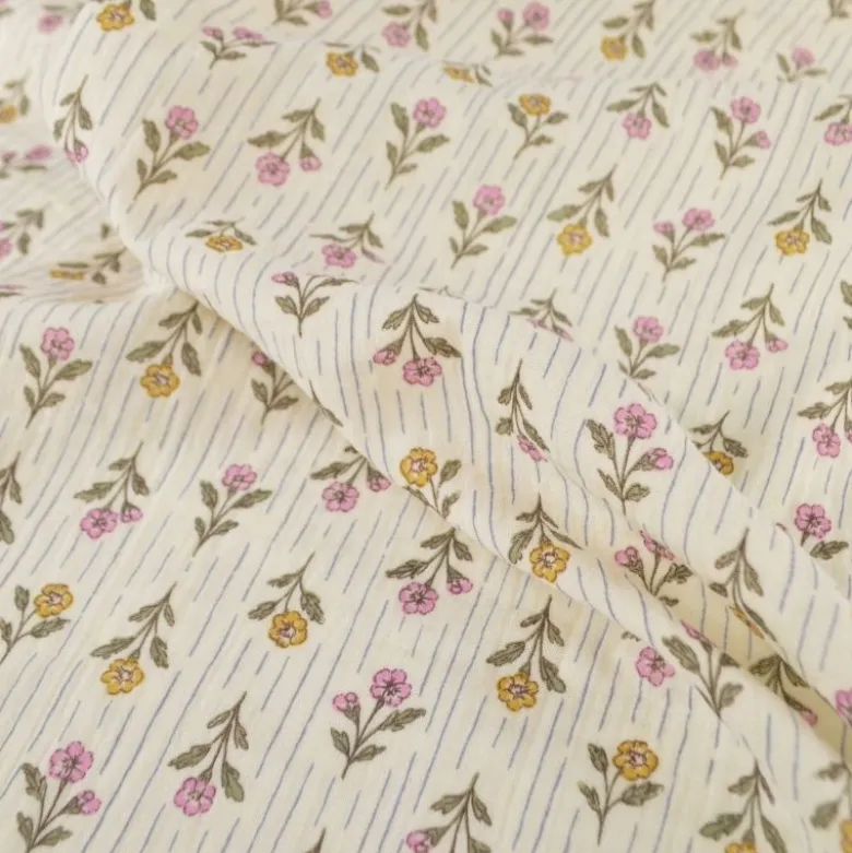 Tissu double gaze de coton Aesa fleurs vertes fond écru