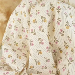 Tissu double gaze de coton Aesa fleurs vertes fond écru