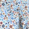 Tissu double gaze de coton Aryada fleurs bleues fond écru