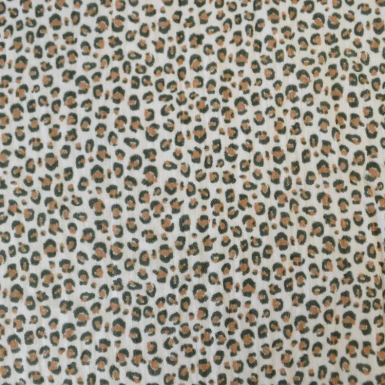 Tissu double gaze de coton Balzac motif Léopard fond écru