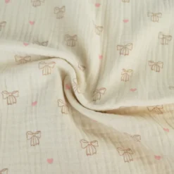 Tissu double gaze de coton Bio Poppy motif nœuds fond naturel