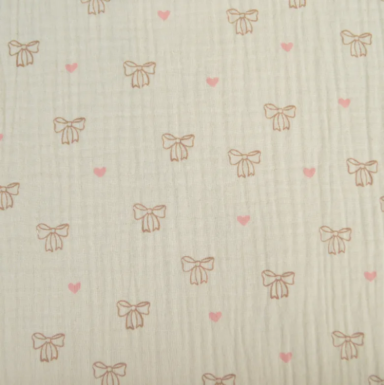 Tissu double gaze de coton Bio Poppy motif nœuds fond naturel