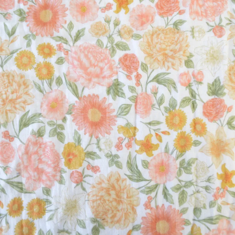 Tissu double gaze de coton Elisabeth motif fleurs tons roses et Abricot