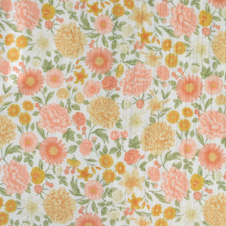 Tissu double gaze de coton Elisabeth motif fleurs tons roses et Abricot