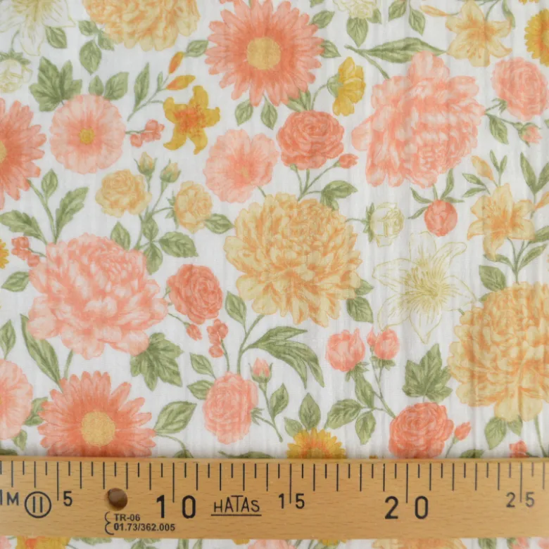 Tissu double gaze de coton Elisabeth motif fleurs tons roses et Abricot