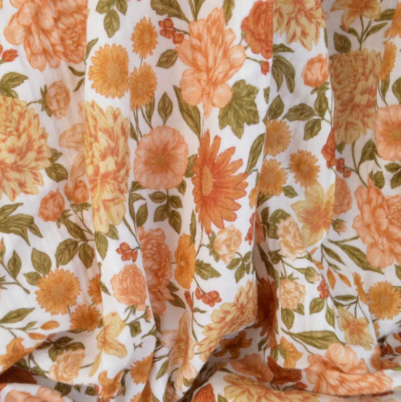 Tissu double gaze de coton Elisabeth motif fleurs tons orangés et rose