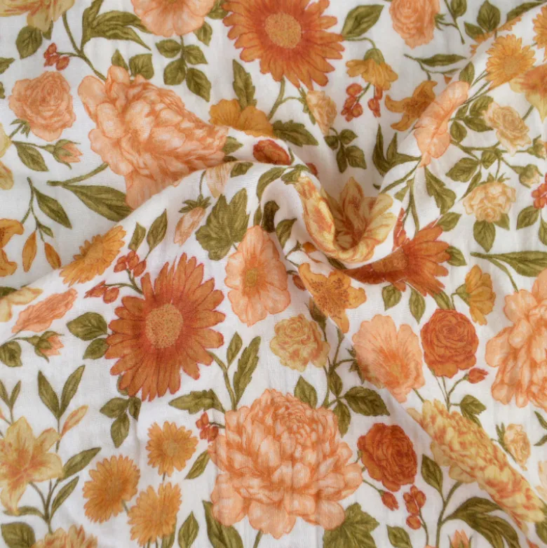 Tissu double gaze de coton Elisabeth motif fleurs tons orangés et rose