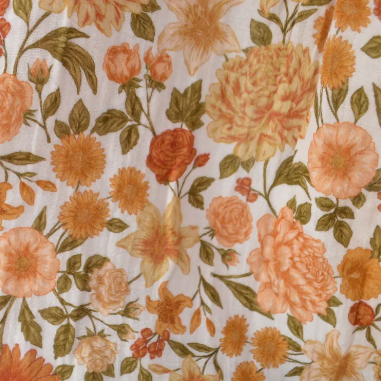 Tissu double gaze de coton Elisabeth motif fleurs tons orangés et rose