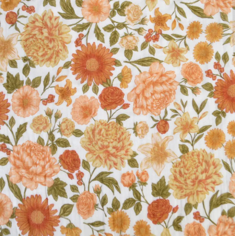 Tissu double gaze de coton Elisabeth motif fleurs tons orangés et rose