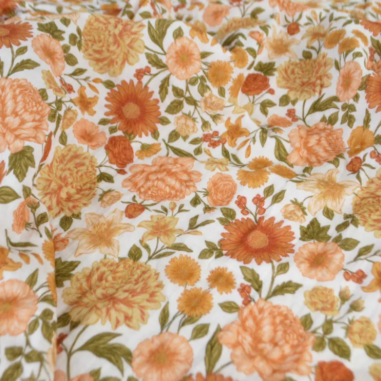 Tissu double gaze de coton Elisabeth motif fleurs tons orangés et rose