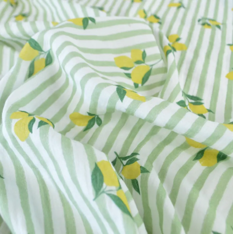 Tissu double gaze de coton Limoncello motif citrons et rayures Amande