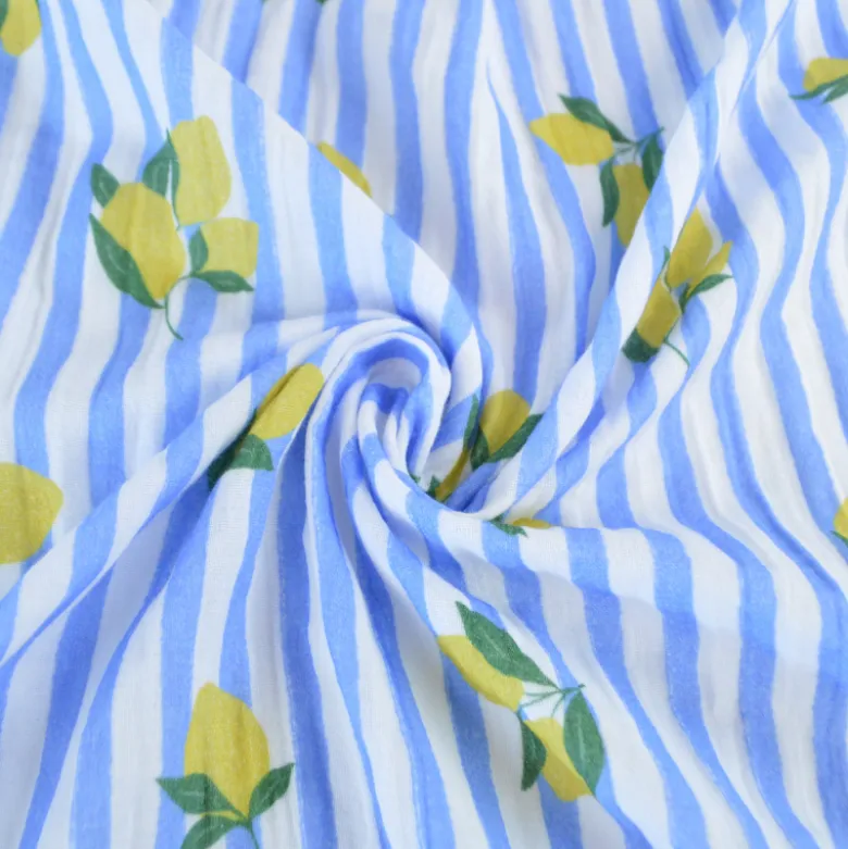 Tissu double gaze de coton Limoncello motif citrons et rayures bleues