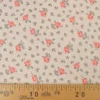 Tissu double gaze de coton Olympe fleurs rose fond latté
