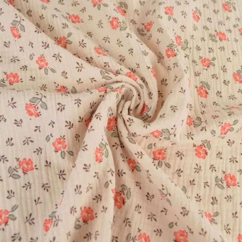 Tissu double gaze de coton Olympe fleurs rose fond latté