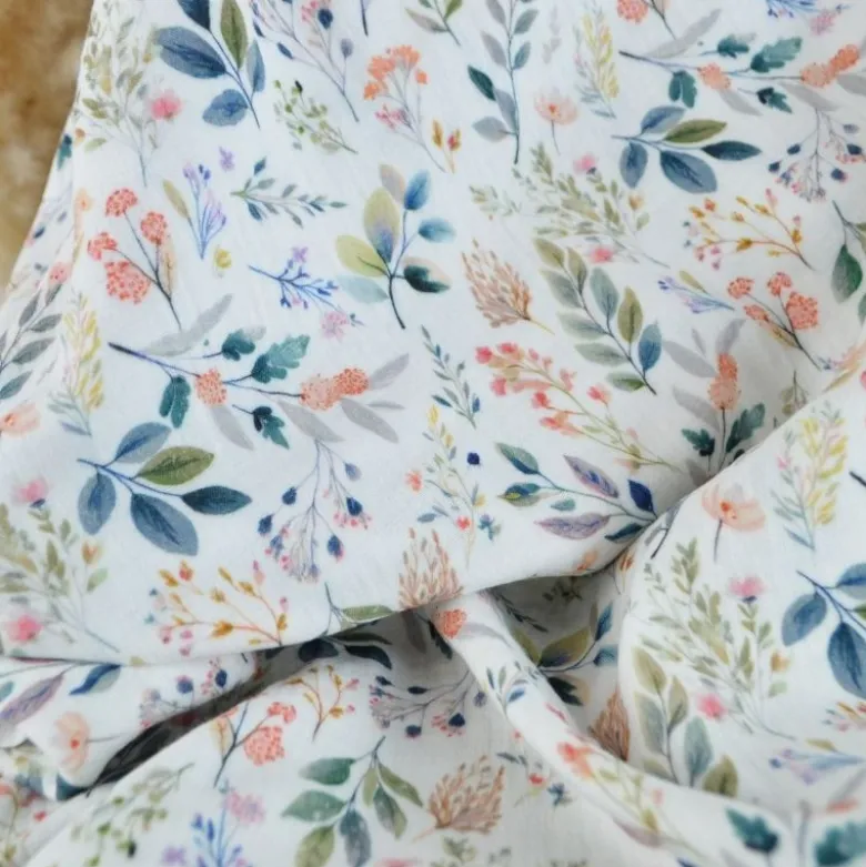 Tissu double gaze de coton Philae motif herbes fond blanc