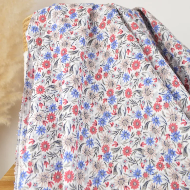 Tissu double gaze de coton Samflo fleurs bleues sur fond blanc