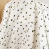 Tissu double gaze Maureen imprimé léopard doré – fond blanc cassé