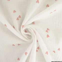Tissu Double gaze motif coeurs roses pâle fond blanc - OEKO TEX
