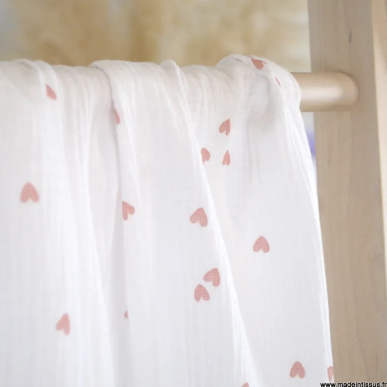 Tissu Double gaze motif coeurs roses pâle fond blanc - OEKO TEX