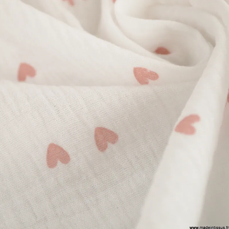 Tissu Double gaze motif coeurs roses pâle fond blanc - OEKO TEX